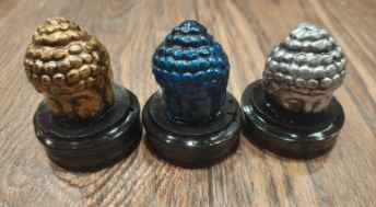 CABEZA DE BUDA ILUMINACION PORTA SAHUM RESINA C/U